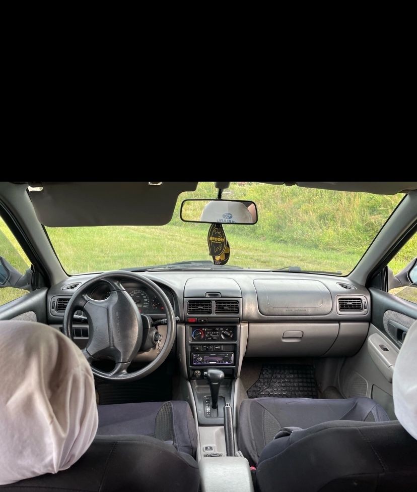 Subaru Impreza 1-го поколения в кузове универсал (GF) 1999год рестайлинг